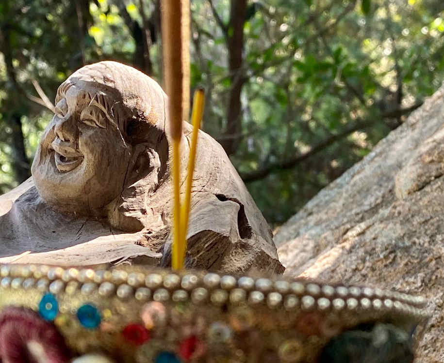 relaxed buddha laughing - Sufi meditation center Cala Jami
